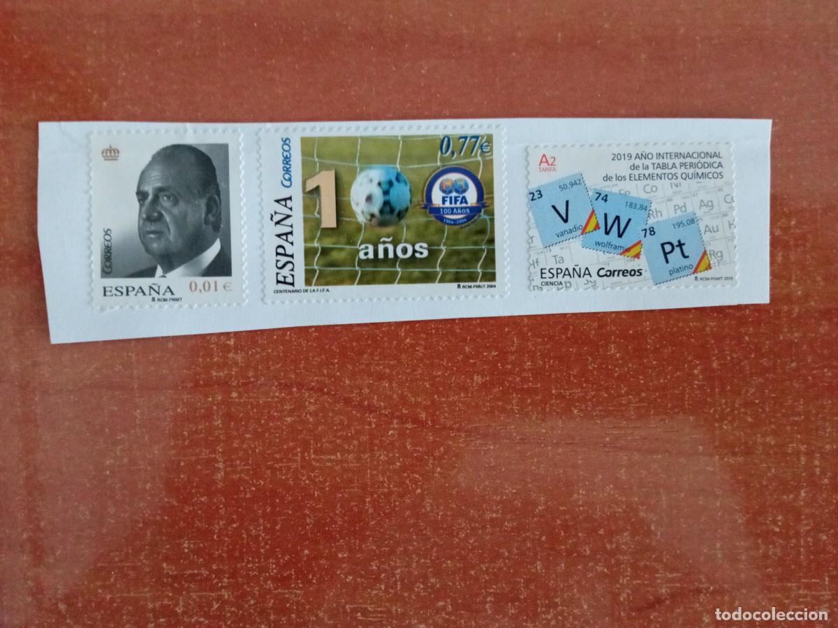 Sellos: 3 SELLOS ESPA&Ntilde;OLES, 100 A&Ntilde;OS FIFA Y OTROS DOS, PEGADOS PERO SIN MATASELLAR
