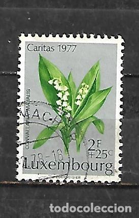 Sellos: 1977: Caritas. Orqu&iacute;deas - Convallaria majalis (usado)