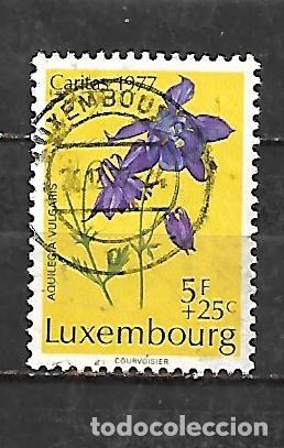 Sellos: 1977: Caritas. Orqu&iacute;deas - Aquilegia vulgaris (usado)