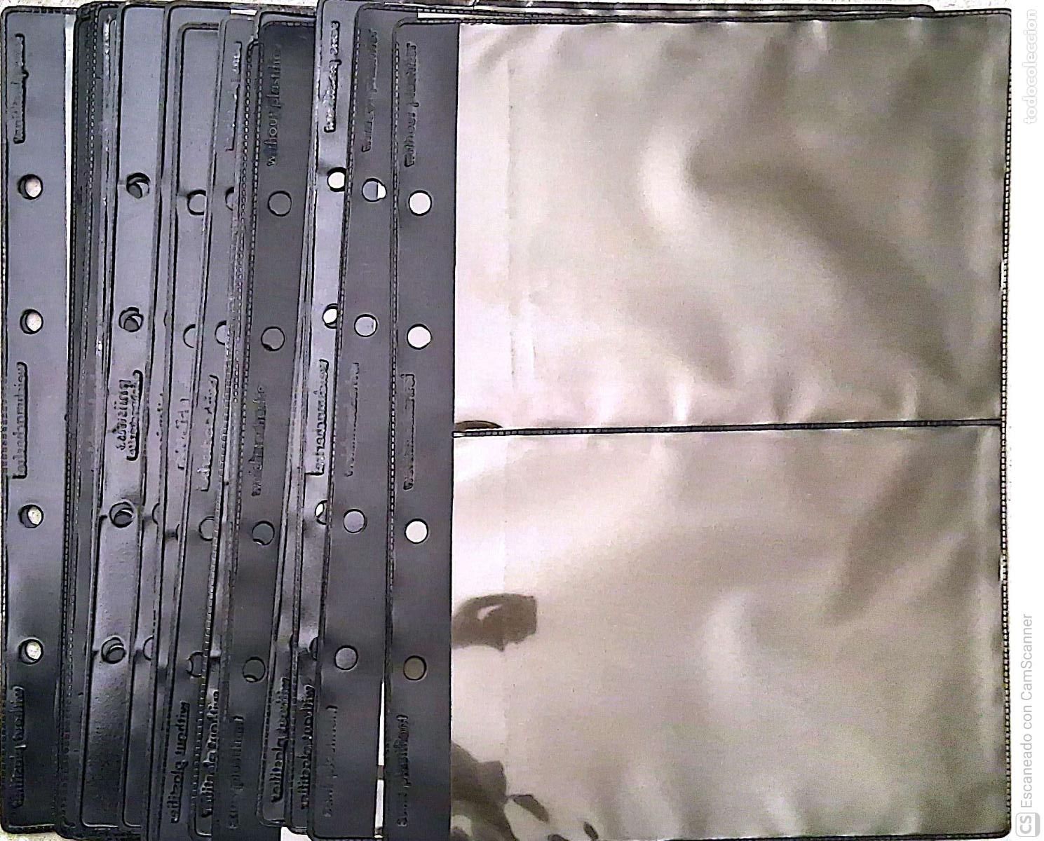 Sellos: 24 Hojas de pl&aacute;stico negras del tama&ntilde;o 20,5 x 27,5 cm, con 4 compartimiento y con 4 agujeros .