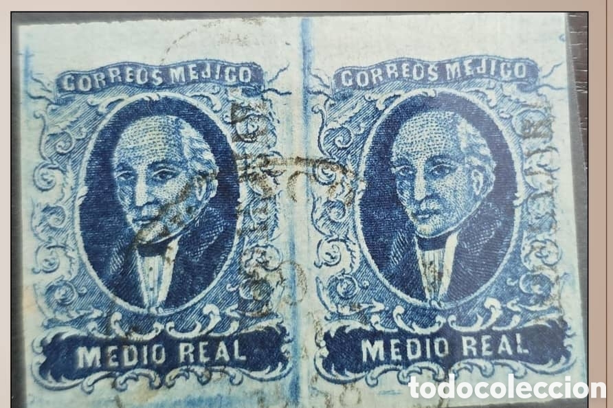 Sellos: CA)1856.DISTRICT: GUADALAJARA Pair of &frac12; real, imperforate, with circular cancellation. Plate III.