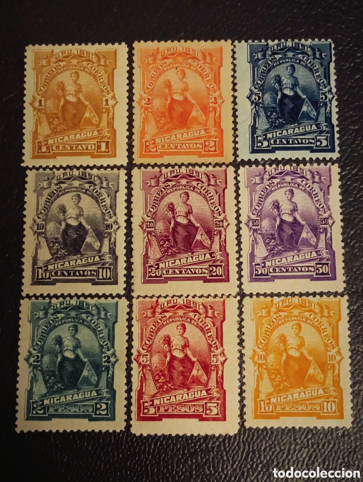 Sellos: Nicaragua 1891 - Serie Alegor&iacute;a Abundancia - Lote 9 Sellos MH con Goma (Scott #31/39 + #40) Naranja