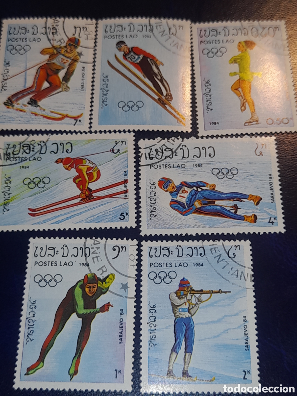 Sellos: Sello Laos mtdo 1984. Juegos olimpiada invierno. Sarajevo. Deporte. Competici&oacute;n. Esqu&iacute;. Patinaje. Ti