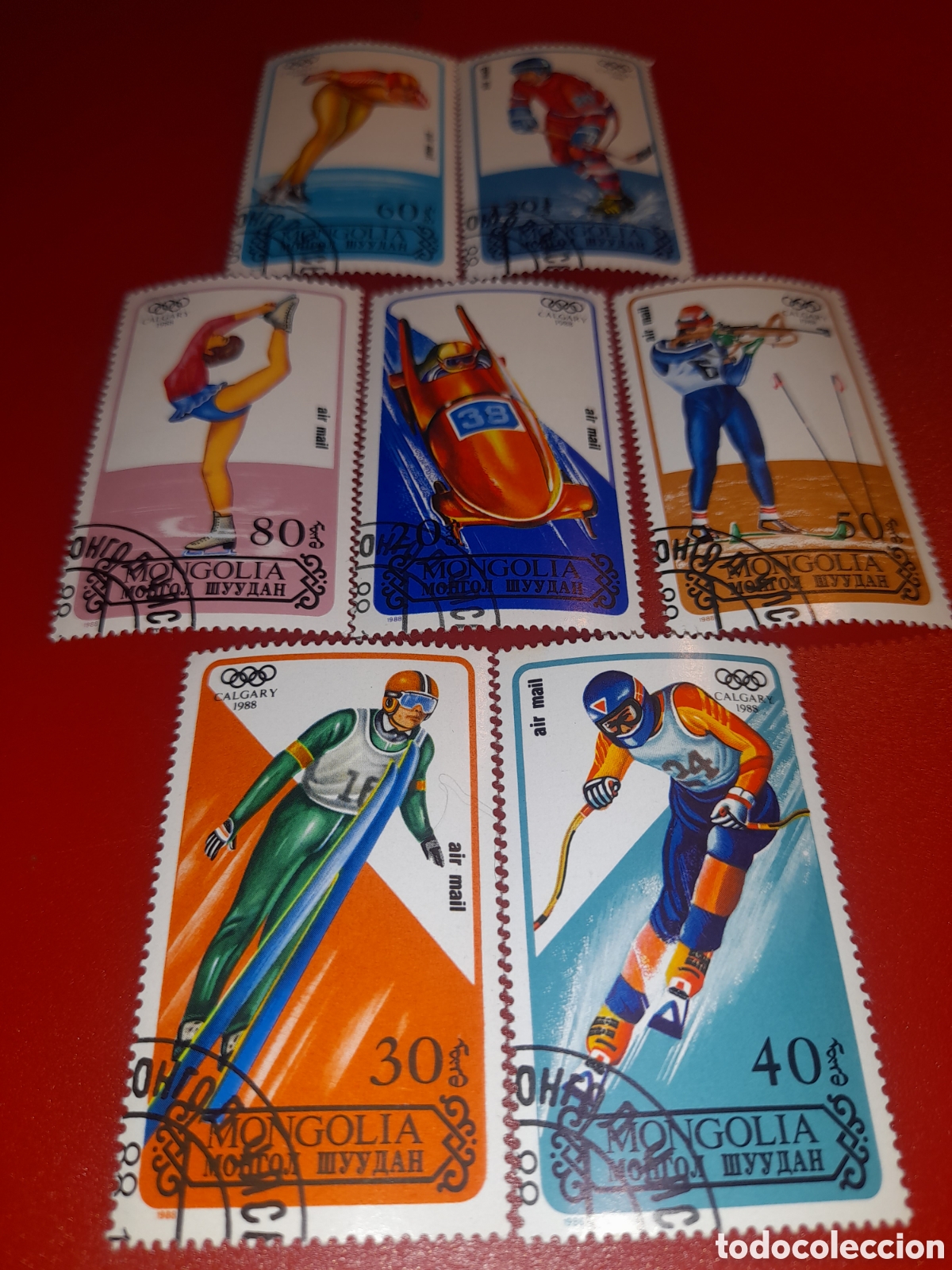 Sellos: Sello Mongolia mtdo 1988. Juegos olimpiada invierno. Calgary,88. Deporte. Atletas. Tiro. Esqu&iacute;. Salt