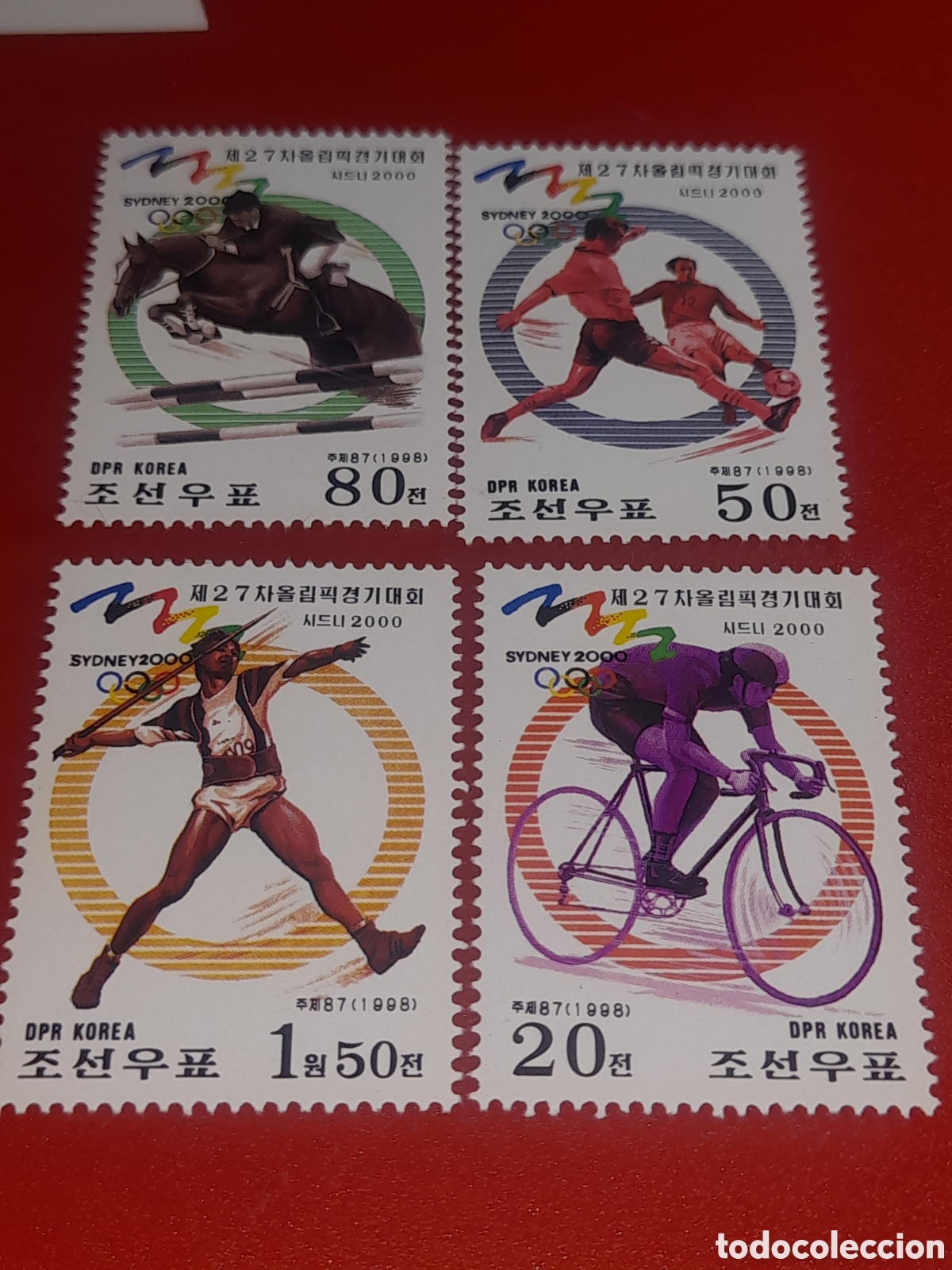Sellos: Sello Corea Norte nuev 1998. Juegos olimpiada. Sydney. Deporte. Atletas. Ciclismo. Doma. Caballo Fut