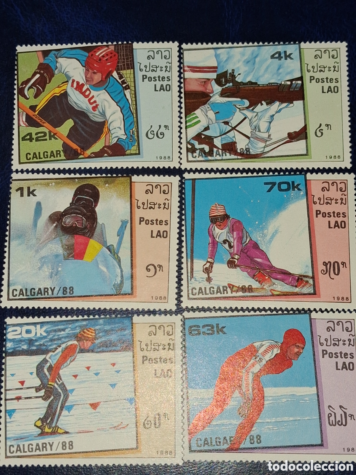 Sellos: Sello Laos no mtdo/rdo 1988. Juegos olimpiada invierno. Calgary. Deporte. Esqu&iacute;. Fondo. Tiro. Hocke