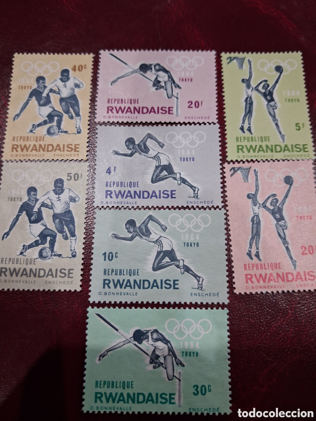 Sellos: Sello Ruanda no mtdo/rdo 1964. Juegos olimpiada. Tokio. Deporte. Salto. Carreras. Baloncesto. Futbol