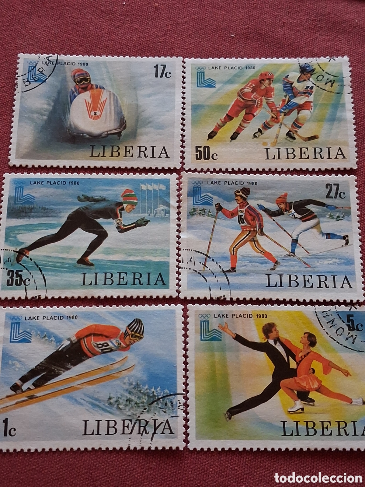 Sellos: Sello Liberia mtdo/rdo 1980. Juegos olimpiada invierno. Lake Pl&aacute;cido. Deporte. Patinaje. Fondo. Esqu