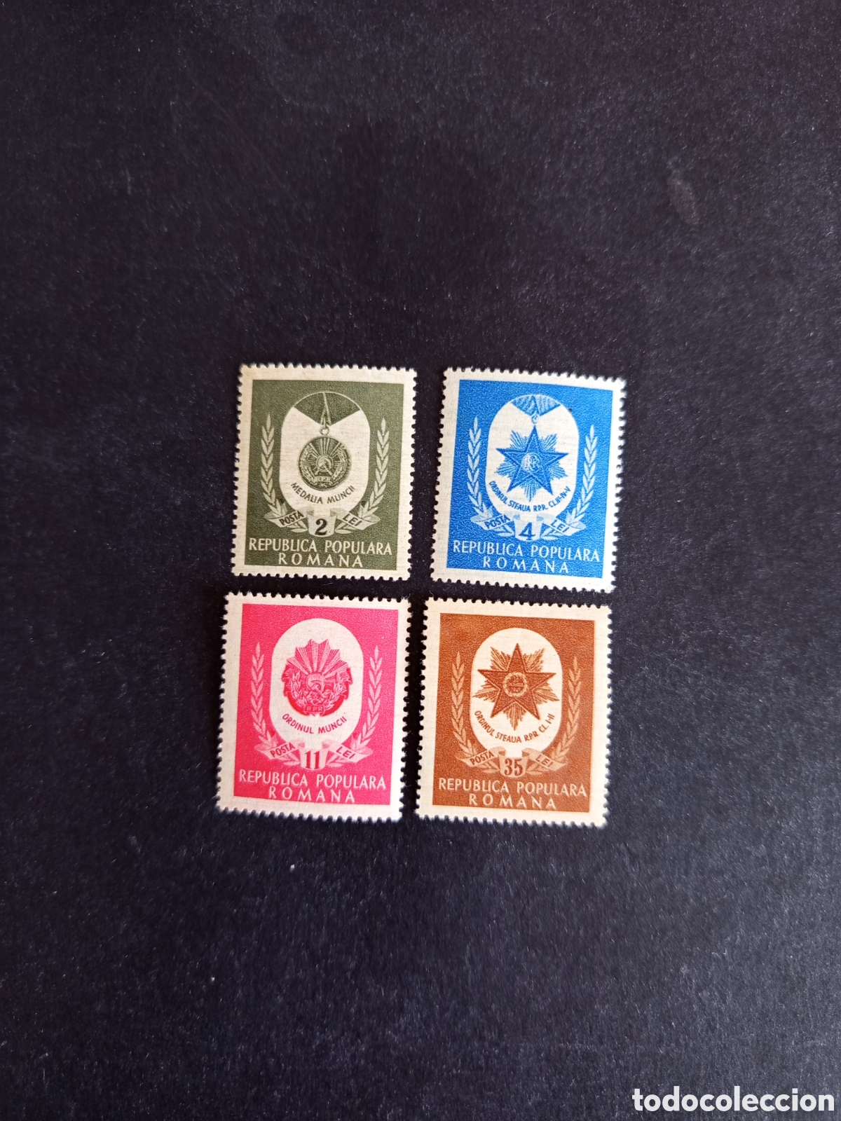 Sellos: Ruman&iacute;a, 1951. 1 Mayo . Medallas. Condecoraciones. Yv. 1142/5. Serie completa. Pedido m&iacute;nimo 3 &euro;.