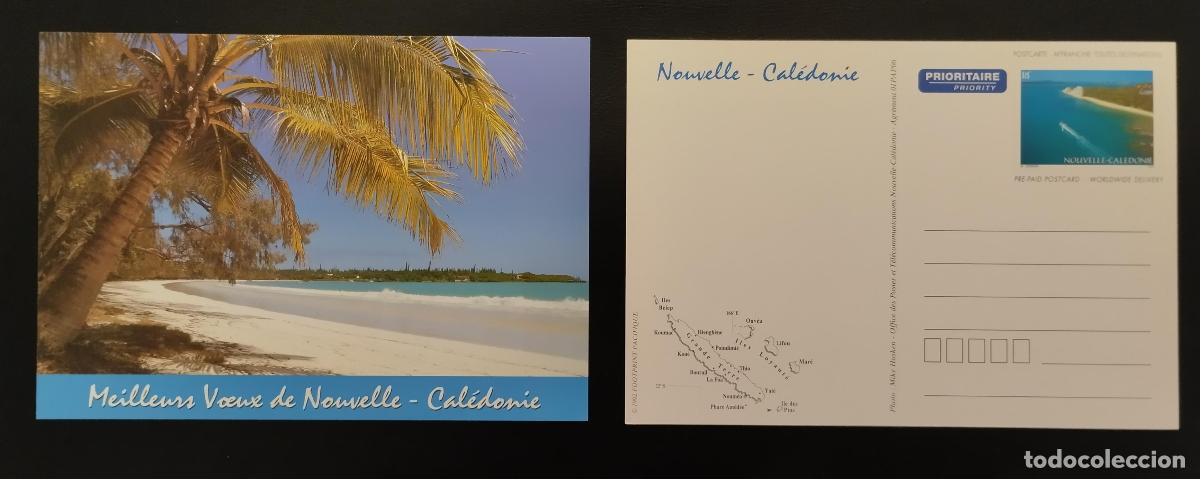 Sellos: Tarjeta presellada de New Caledonia Complete con sus mejores deseos para palmeras playa