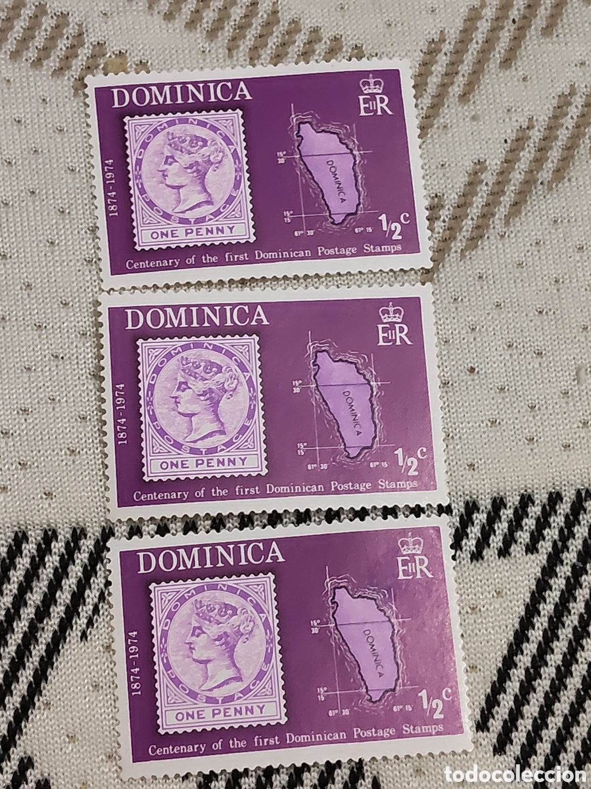 Sellos: 3 sellos de Dominica reproduce el primer sello hist&oacute;rico de la isla de 1874 con la efigie de la Rei-