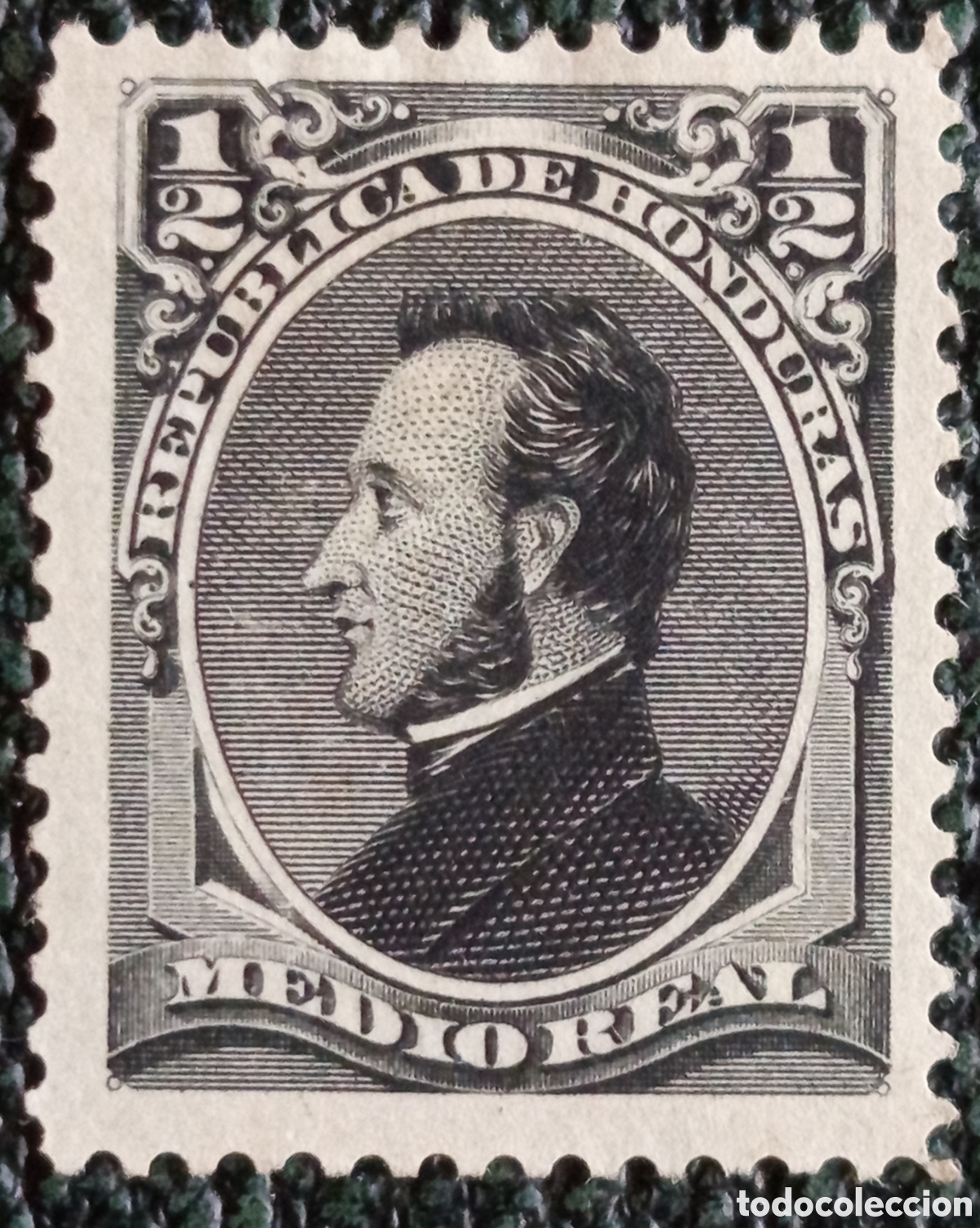 Sellos: Honduras 1878 General Francisco Moraz&aacute;n Medio Real Negro - Scott #1 MH