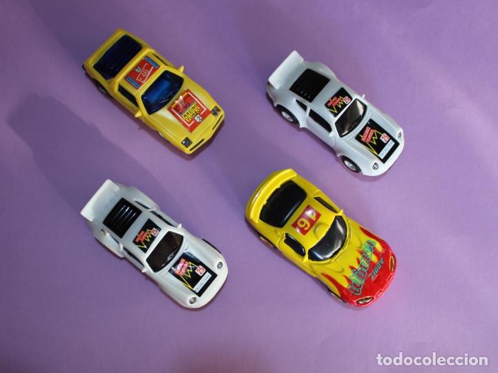 Slot Cars: Lote de 12 coches Made in China de slot de diversas procedencias. Tambi&eacute;n Recambios