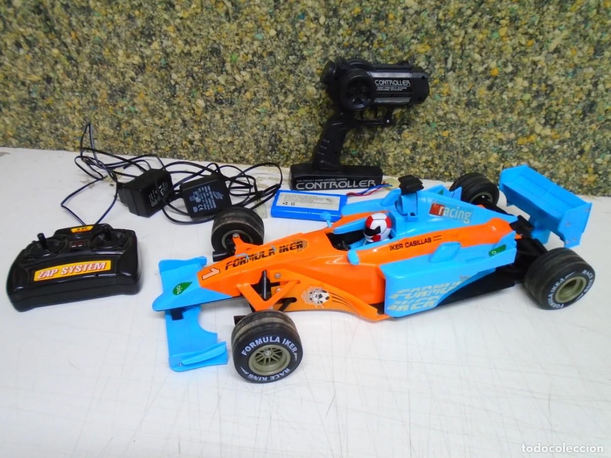 Slot Cars: COCHE RADIOCONTROL DE FORMULA 1,EDICION IKER CASILLAS,MARCA SIMBA,VER FOTOS.
