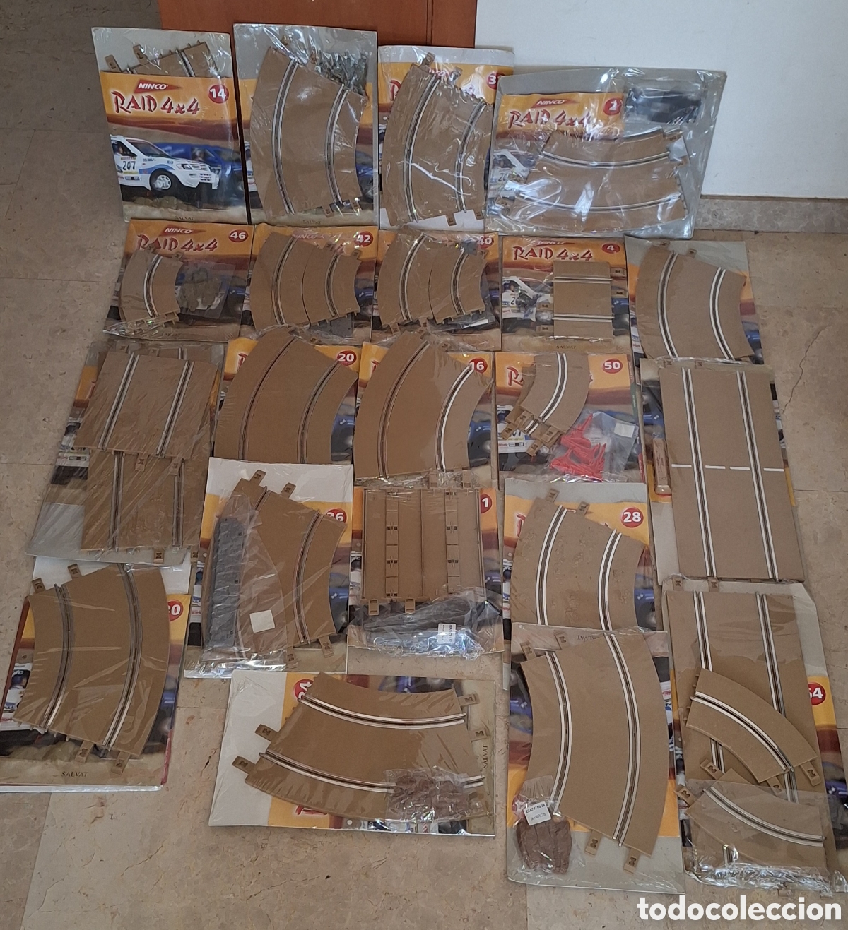 Slot Cars: Lote de 22 F&aacute;sciculos Scalextric Ninco Raid 4X4 Salvat -