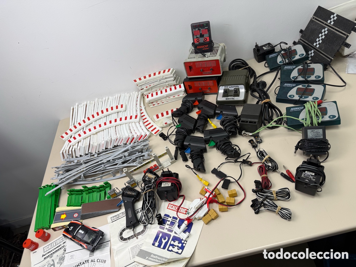 Slot Cars: Lote material slot Scalextric y Ninco. Transformadores, cuenta vueltas, mandos cables etc