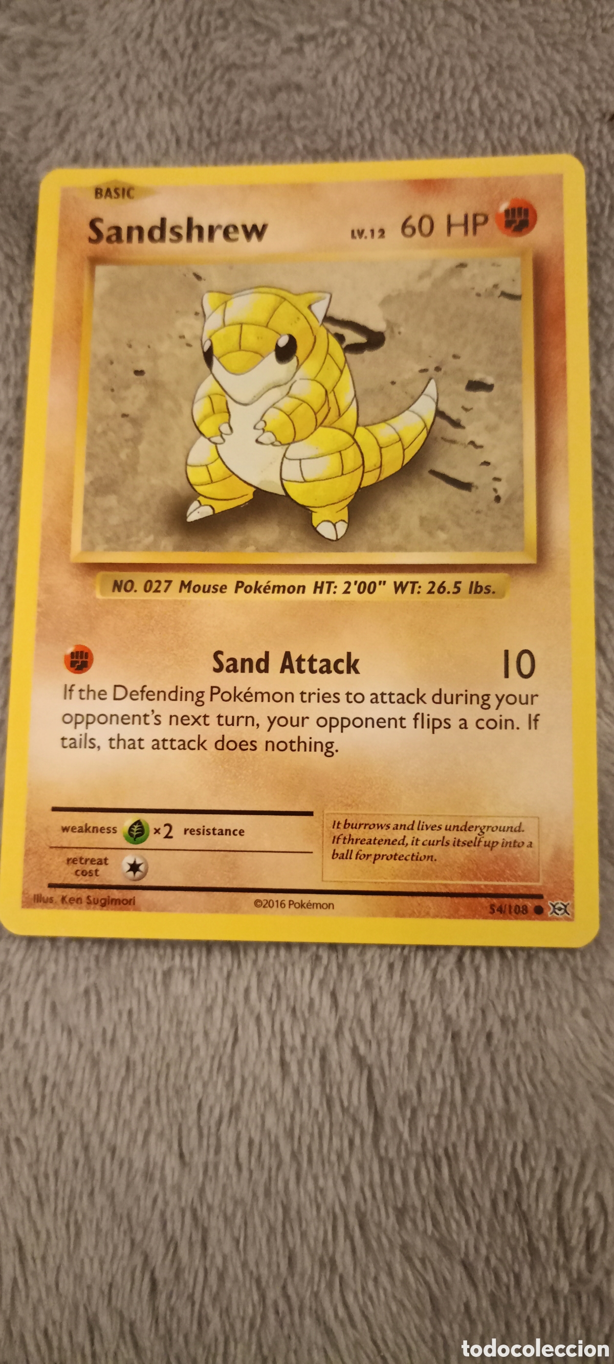Carta Pokémon en inglés, Sandshrew n° 027, año 2016