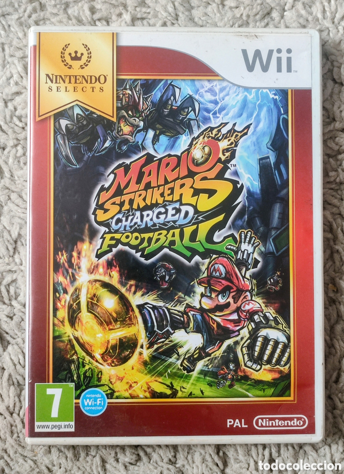 Nintendo Wii RVL-101 2011 Negra (Family Edition) y Videojuego Mario Strikers Charged Football Wii