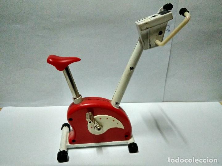 Bicicleta estática con mechero