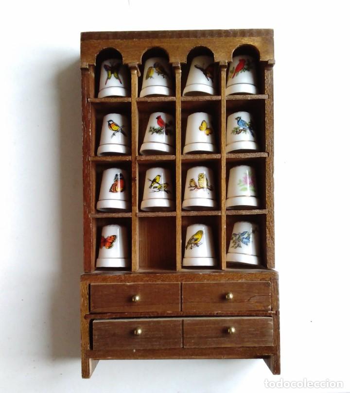 Expositor de dedales