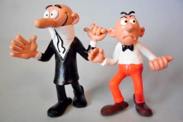 Figuras de Mortadelo y Filemón.