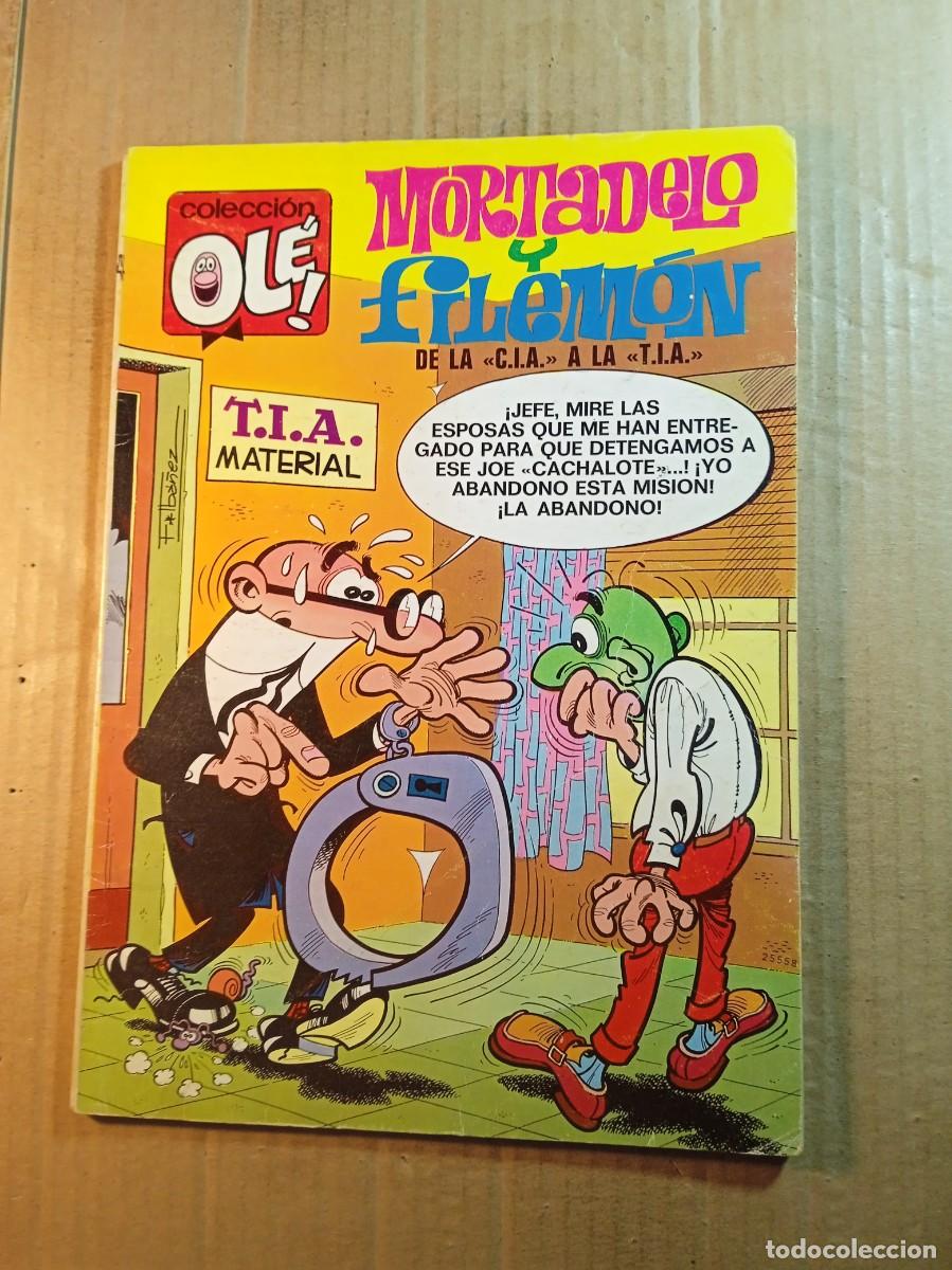 Tebeos: TEBEO DE OLE MORTADELO Y FILEMON EN DE LA C.I.A. A LA T.I.A. DEL A&Ntilde;O 1976 N&ordm; 104 NUMERO EN EL LOMO