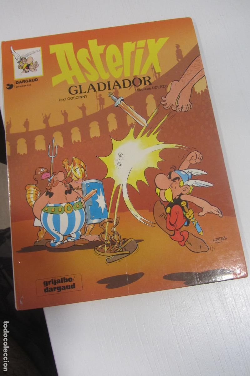 Tebeos: ASTERIX N&ordm; 4 - ASTERIX GLADIADOR TAPA DURA GOSCINNY UDERZO EN CATAL&Agrave; GRIJALBO BUEN ESTADO ARX375