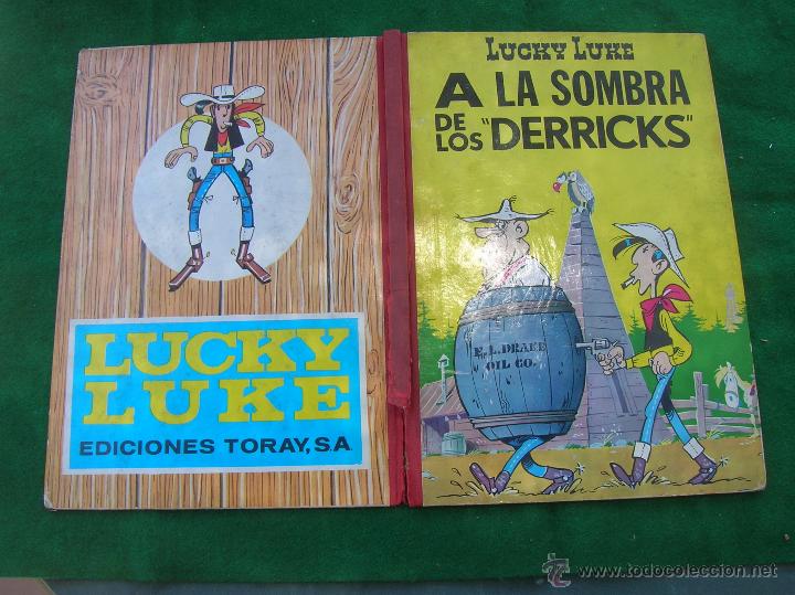 Tebeos: LUCKY LUKE TORAY PRIMERA EDICION A LA SOMBRA DE LOS DERRICKS - Foto 1