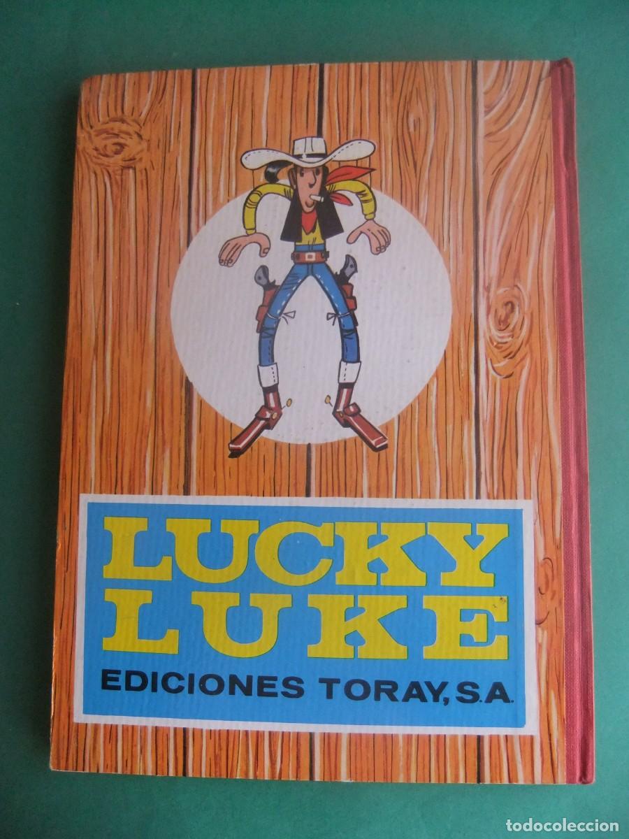 Tebeos: LUCKY LUKE ALA SOMBRA DE LOS DERRICKS EDITORIAL TORAY 1968 - Foto 2