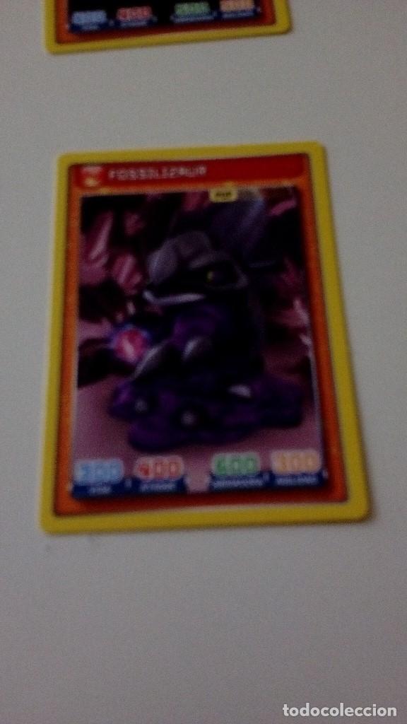 Trading cards: CAJ-23D32 CROMO FICHA PANINI INVIZIMALS FOSSILIZAUR