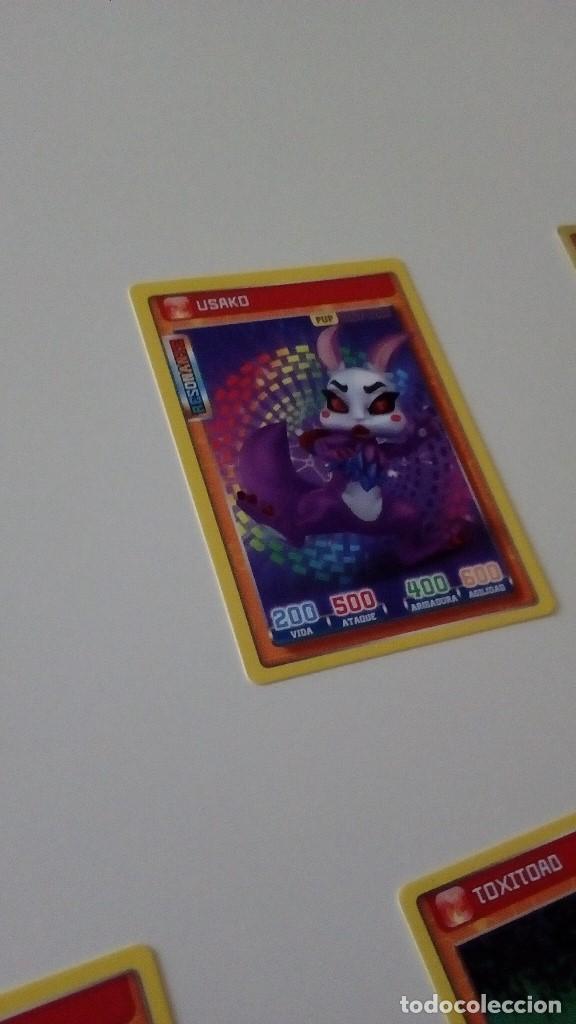 Trading cards: CAJ-23D32 CROMO FICHA PANINI INVIZIMALS RESONANTE USAKO