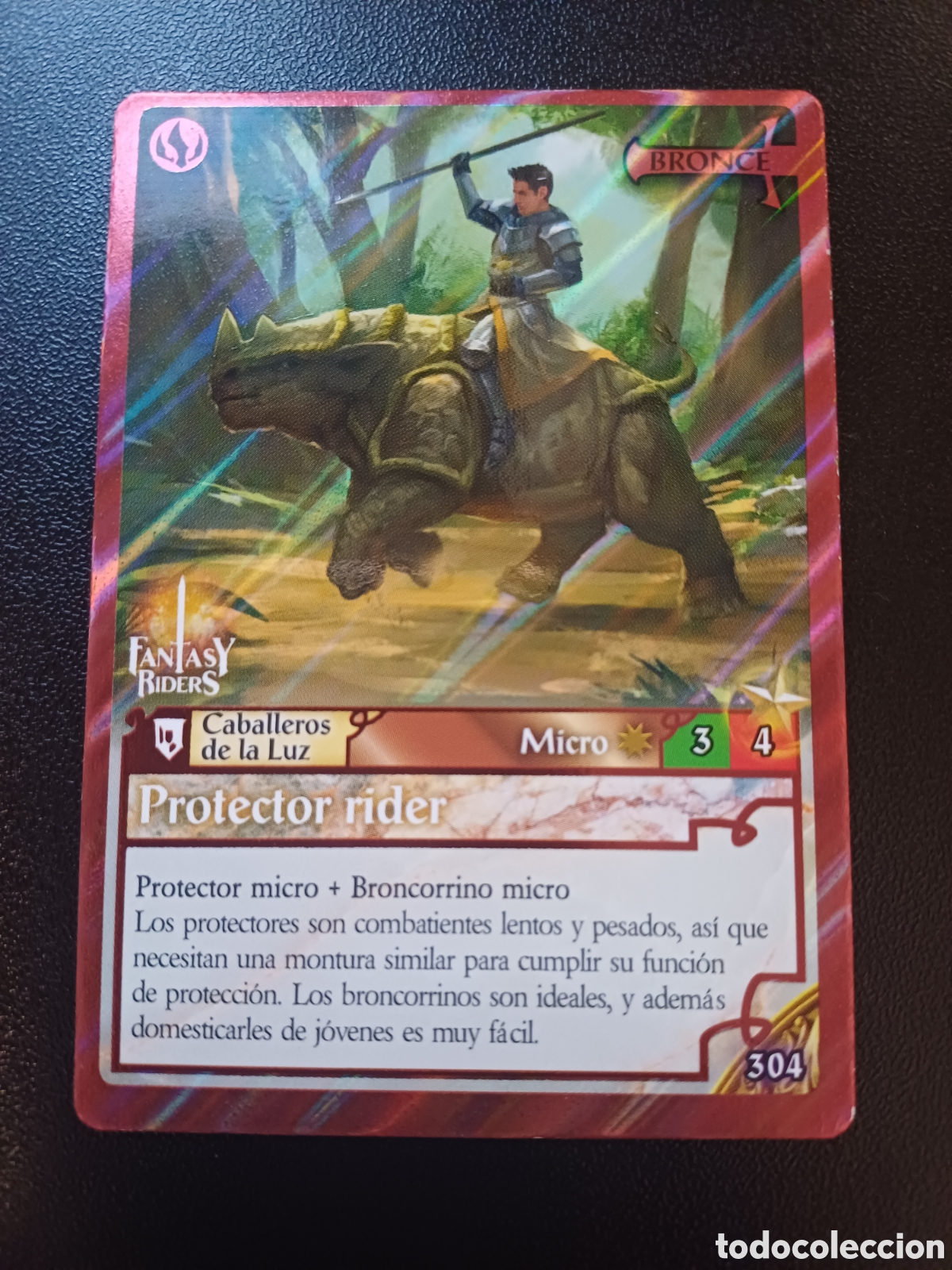 Cartas Colecion&aacute;veis: #304 PROTECTOR RIDER MICRO BRONCE PANINI FANTASY RIDERS LA INVASION DE LOS GIGANTES 2019