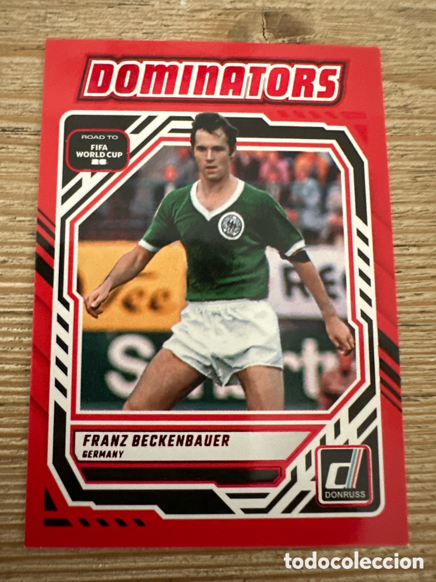 Trading Cards: FRANK BECKENBAUER ALEMANIA DOMINATORS 24 RED PARALLEL DONRUSS ROAD TO FIFA WORLD CUP 2026 PANINI