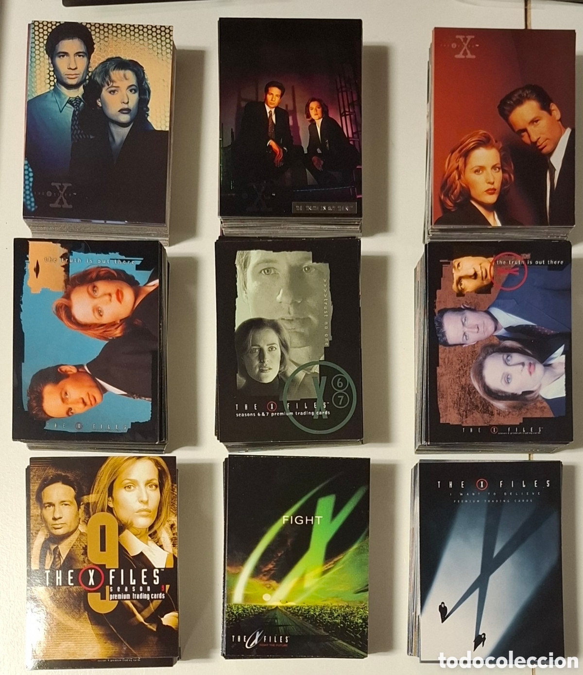 Trading cards: X-Files lote 9 sets de trading cards