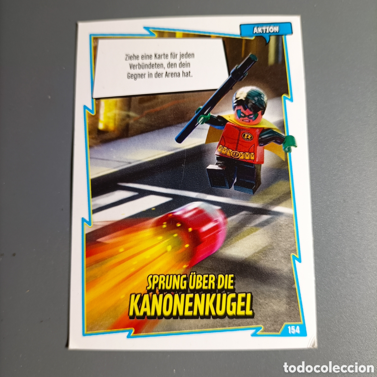 Trading cards: LEGO Batman Trading Card - N&ordm; 154 &rdquo;SPRUNG &Uuml;BER DIE KANONENKUGEL&rdquo; - Robin