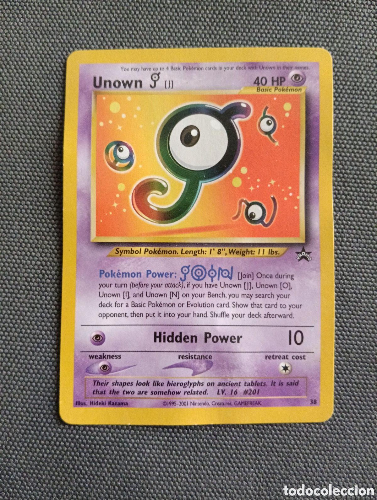 Trading cards: Carta promocional Pok&eacute;mon Unown J