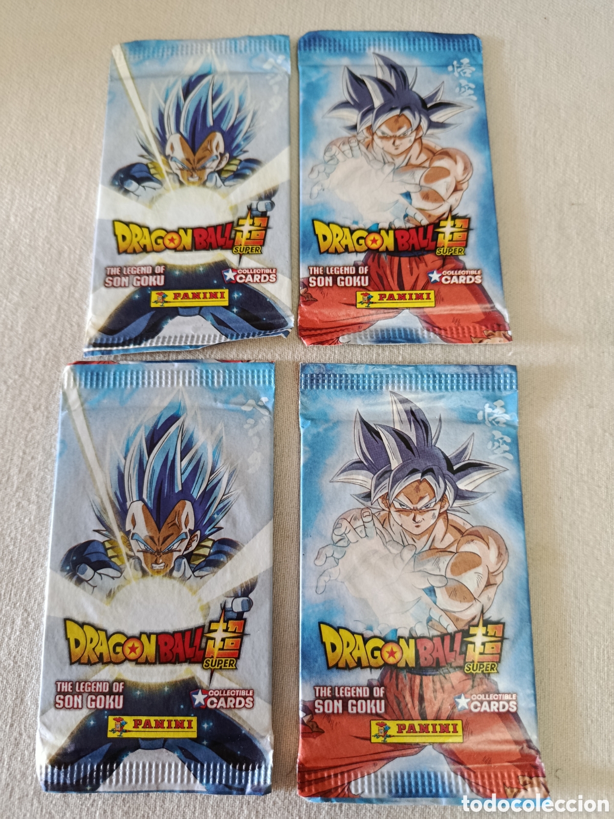 Trading cards: Lote de cuatro sobres cerrado - drag&oacute;n ball super - the legend of son goku