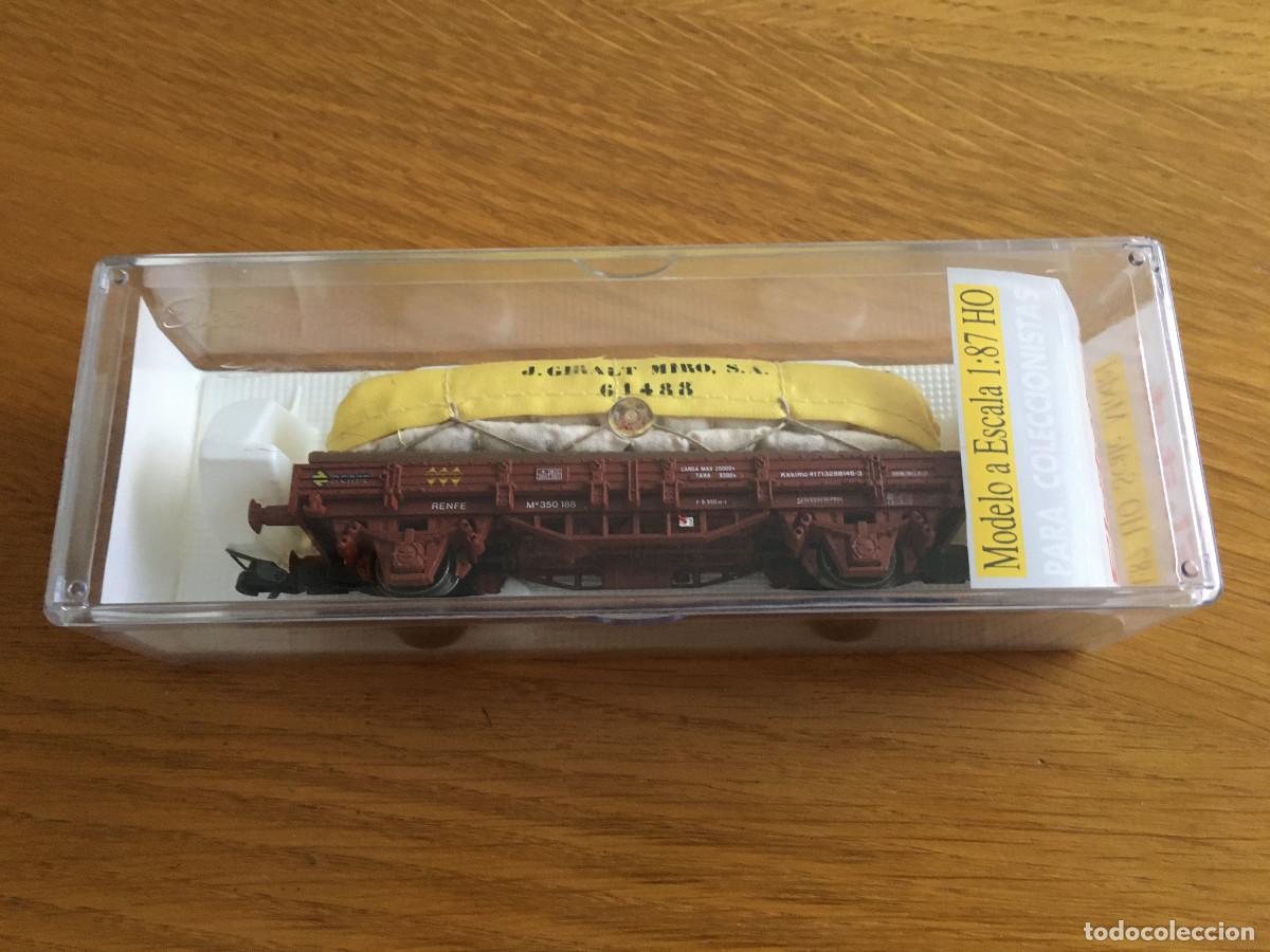 Trenes escala: Vag&oacute;n plataforma Electrotren HO con carga de sacos J. Giralt Mir&oacute; - Ref. 1022