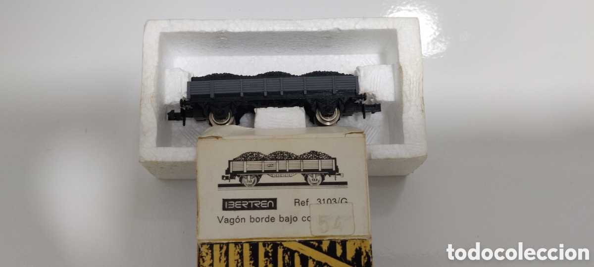Trenes Escala: IBERTREN N - VAG&Oacute;N BORDE BAJO GRIS CON CARGA REF. 3103