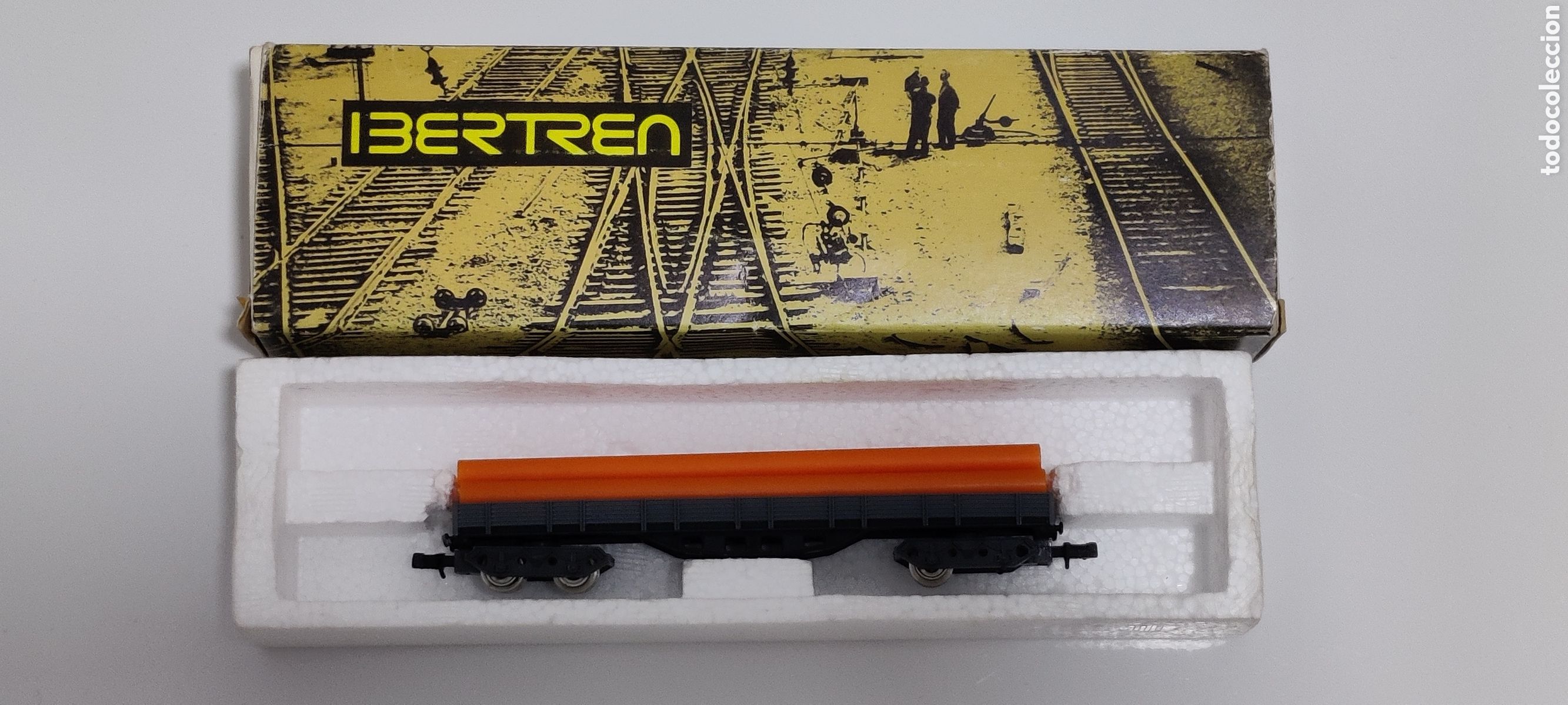 Trenes Escala: IBERTREN N - VAG&Oacute;N BORDE BAJO 4 EJES CON TUBOS REF. 3602