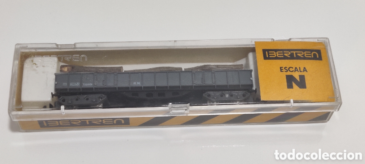 Trenes escala: IBERTREN N - VAG&Oacute;N BORDE ALTO 4 EJES GRIS CON TRONCOS, REF. 416.