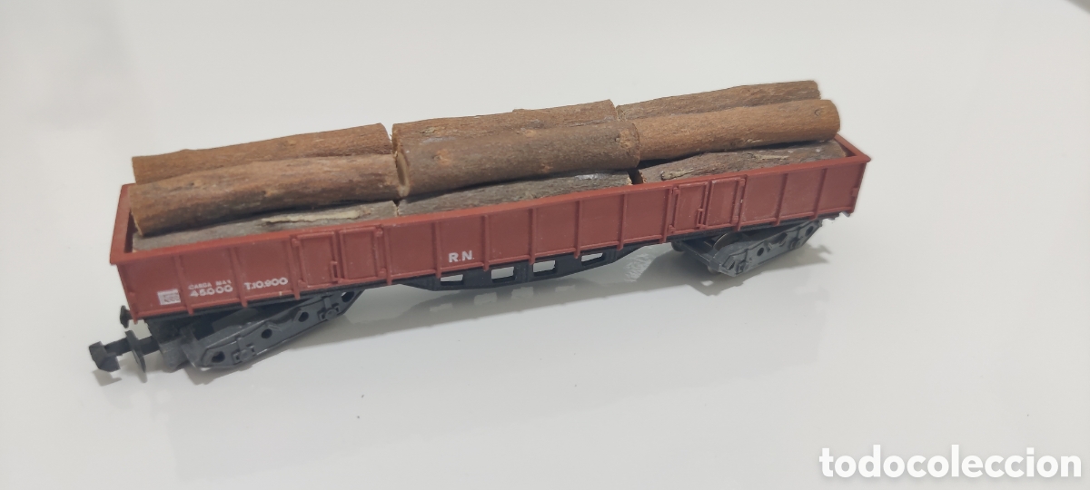 Trenes escala: IBERTREN N - VAG&Oacute;N BORDE ALTO 4 EJES MARR&Oacute;N CON TRONCOS, REF. 415