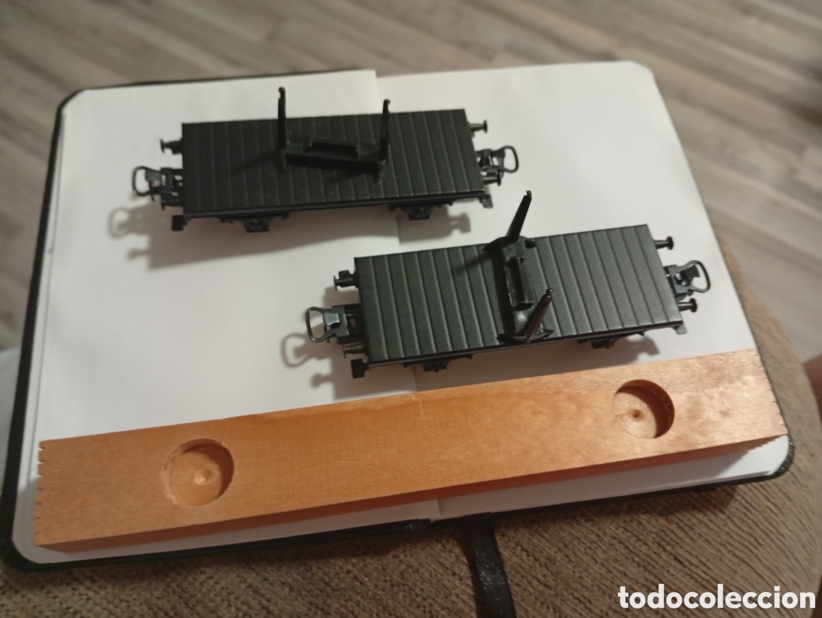 Modelleisenbahnen: Marklin dos vagones porta madera con carga incluida