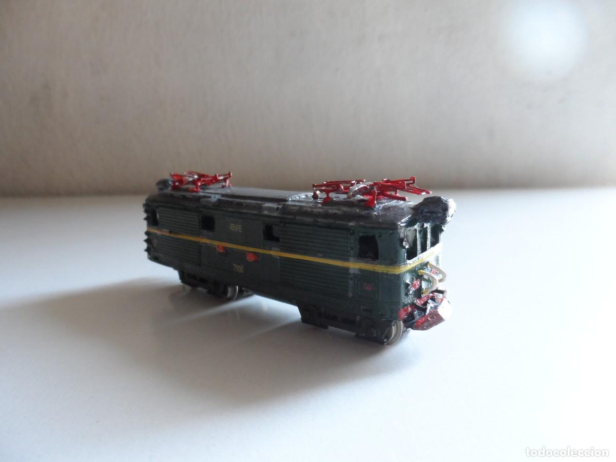 Trenes escala: LOCOMOTORA RENFE 1000 MOTORIZADA CON ATLAS ARTESANAL ESCALA N