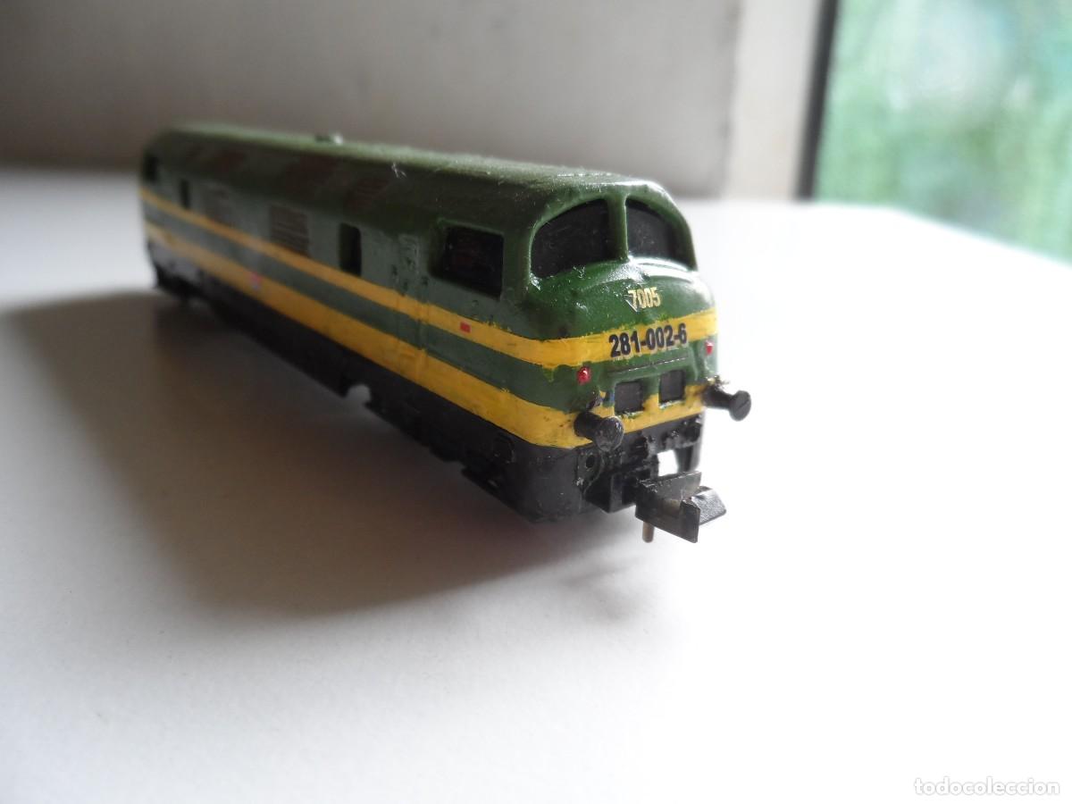 Trenes escala: LOCOMOTORA MINITRIX CON CARCASA REPINTADA ESCALA N