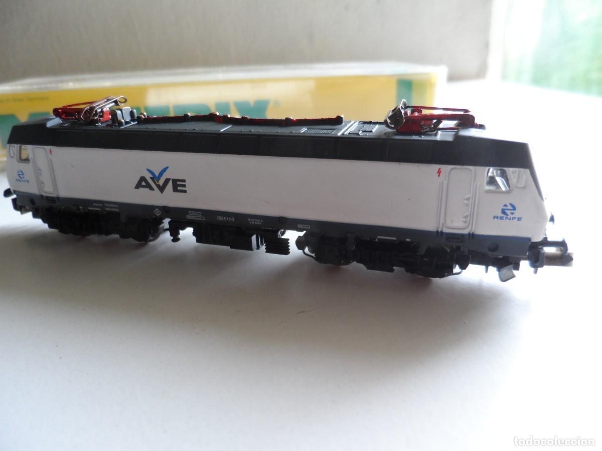 Trenes escala: LOCOMOTORA MOTORIZADA MINITRIX CON CARCASA AVE RENFE ESCALA N
