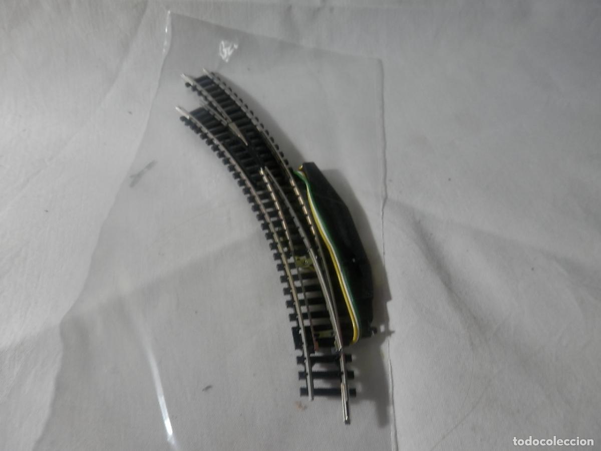 Trenes escala: DESVIO ELECTRICO IZQUIERDO EN CURVA ESCALA N DE MINITRIX