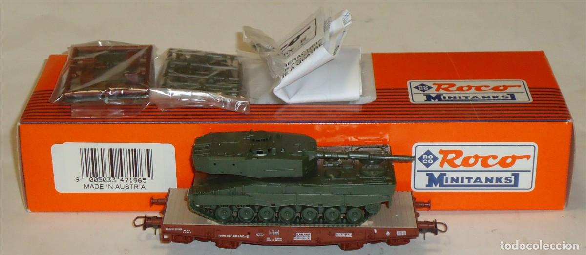 Trenes escala: ROCO HO, VAG&Oacute;N PLATAFORMA 4 EJES PMM CARGADO CON CARRO COMBATE, REF. 47196
