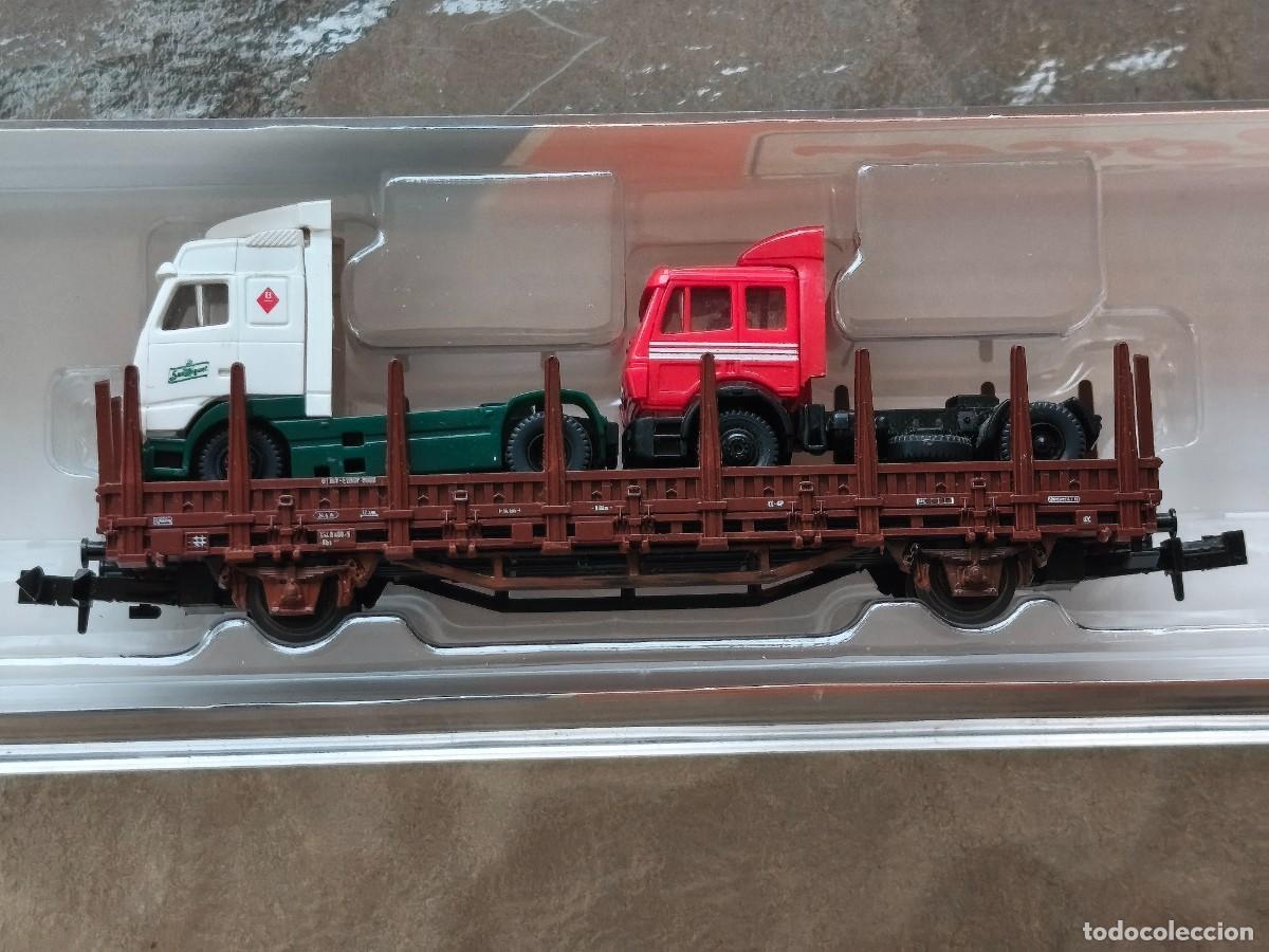 Trenes escala: Roco 25269.1 Vag&oacute;n Mercanc&iacute;as Renfe con dos cabezas tractoras.