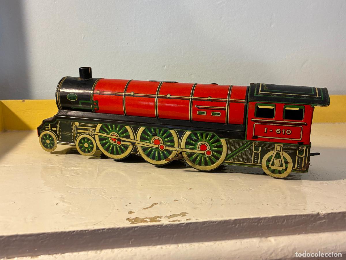 Trenes escala: Locomotora de tren a cuerda juguetes Pay&aacute; hojalata mide 33x11x6, bien conservada ver fotos